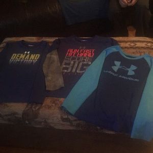 3 Boy size 7 long sleeve under armour shirts.